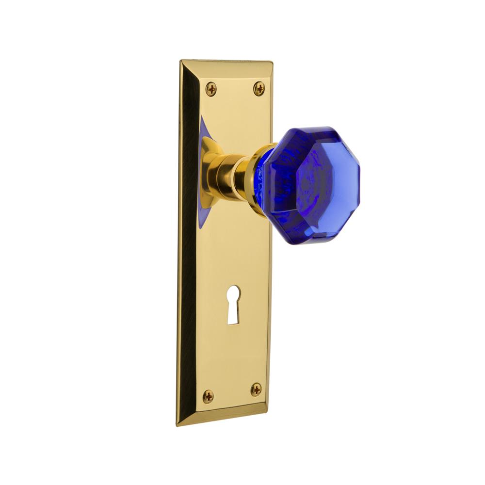 Nostalgic Warehouse NYKWAC Colored Crystal New York Plate with Keyhole Passage Waldorf Cobalt Door Knob in Polished Brass